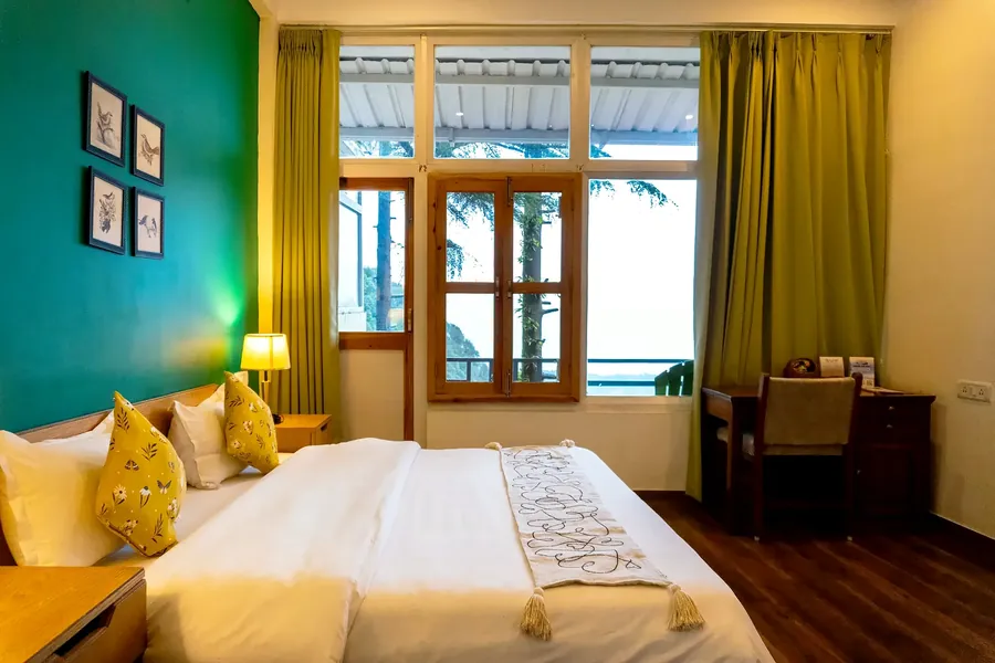 Bed and window seat, Peak View Perch room, The Coverpage Boutique Stays, Mussoorie