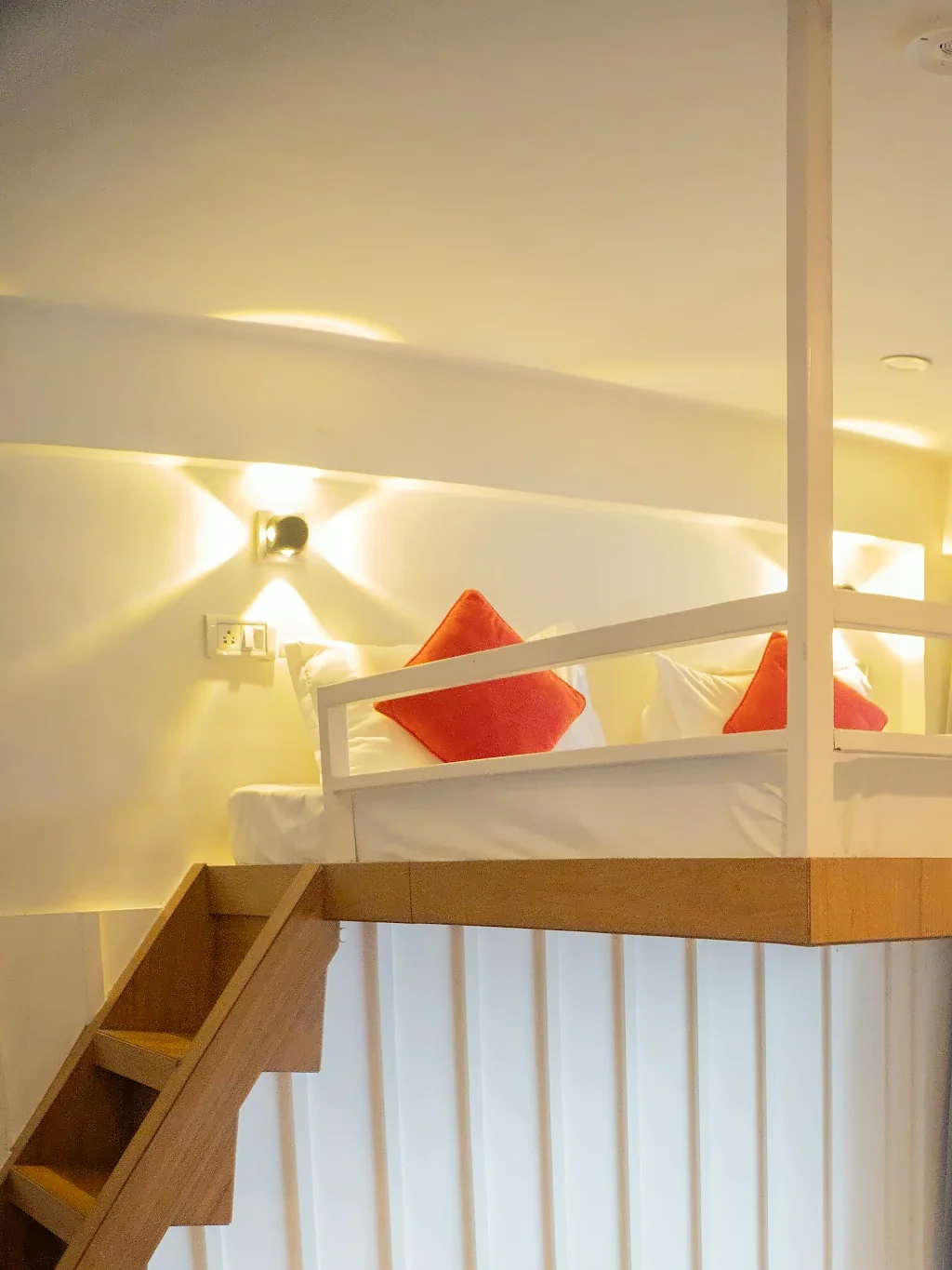 The loft bed under warm lights, Cloud 9 room, The Coverpage Boutique Stays, Mussoorie