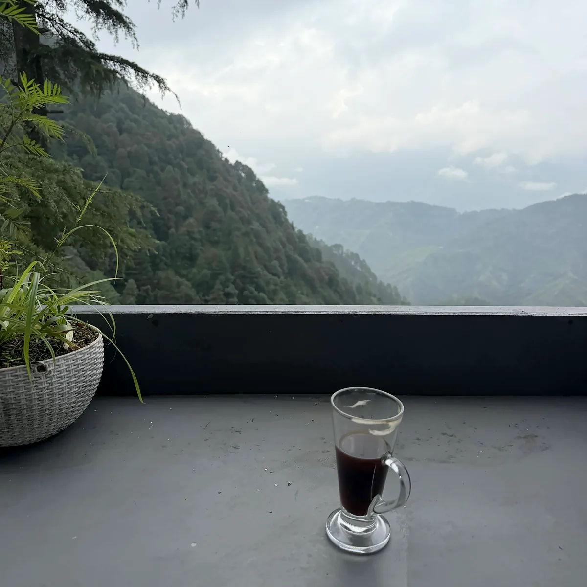 Coffee on the deck above the valley at Mudcup Café, Mussoorie